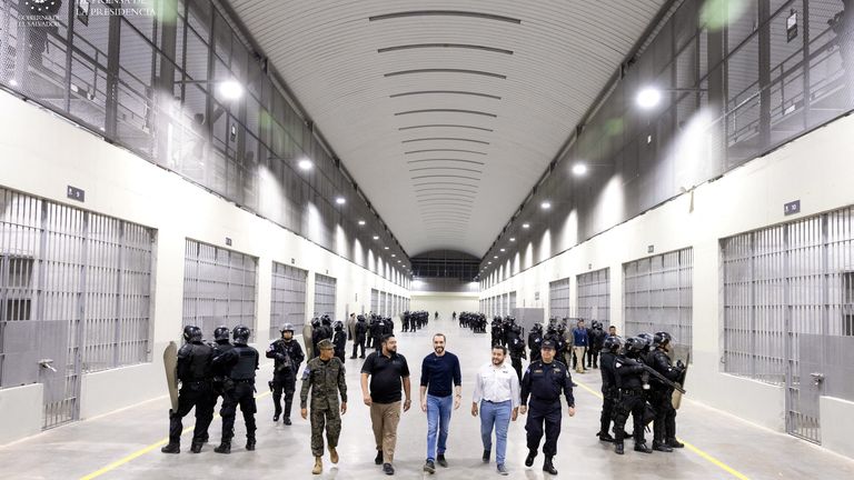 El Salvador’s President Nayib Bukele takes part in a tour during a national television transmission to present the Terrorism Confinement Center in Tecoluca, El Salvador