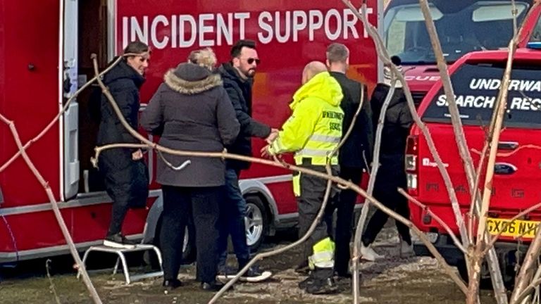 The partner of missing mother-of-two Nicola Bulley, Paul Ansell, (centre in sunglasses) shakes hands with Peter Faulding (in Hi-Vis), the underwater search expert called in by the family to help with the search in the River Wyre in St Michael&#39;s on Wyre, Lancashire. Ms Bulley, 45, was last seen on the morning of Friday January 27, when she was spotted walking her dog on a footpath by the river. Picture date: Wednesday February 8, 2023.