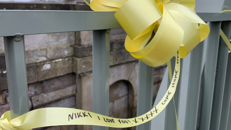 Messages of support have been tied to a footbridge close to the spot where Ms Bulley was last teen