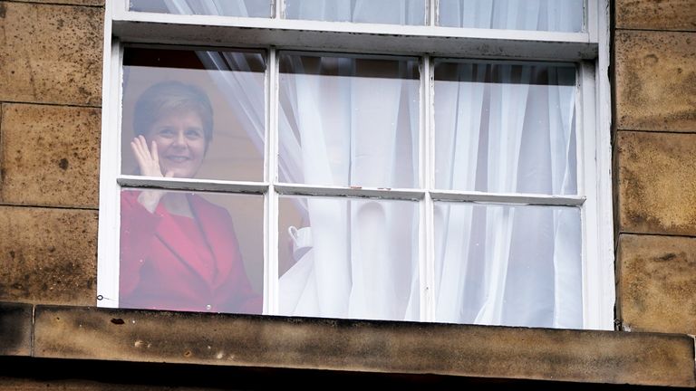 First Minister Nicola Sturgeon waves to members of the public outside Bute House in Edinburgh after she announced during a press conference that she will stand down as First Minister for Scotland after eight years. Picture date: Wednesday February 15, 2023.