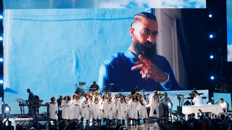 2019 BET Awards - Show - Los Angeles, California, U.S., June 23, 2019 - DJ Khaled and John Legend (R) perform during a tribute to Nipsey Hussle. REUTERS/Mike Blake