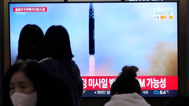 South Korean TV news airs a livestream of the missile&#39;s launch from Pyongyang. Pic: AP