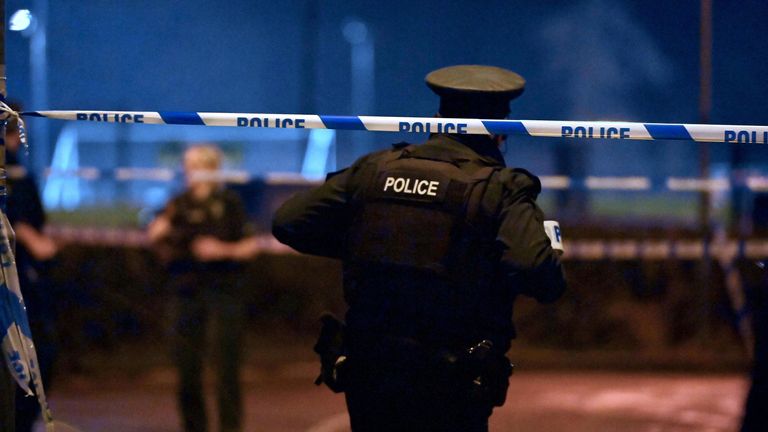 PSNI officers at the scene of a shooting in the Killyclogher Road area of Omagh, where a man, a serving police officer, was injured in a shooting incident at a sports complex in Omagh on Wednesday evening. Picture date: Wednesday February 22, 2023.