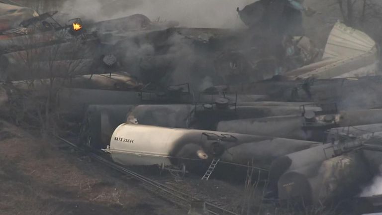 Tankers full of vinyl chloride smoulder after train derailment in Ohio