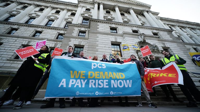 Members Public and Commercial Services (PCS) union of the on the picket line outside the office of HM Treasury, in Westminster.  Around 100,000 civilian servants from 124 government departments, the Border Force, museums and other government agencies are on strike in a dispute over jobs, pay and conditions.  Picture date: Wednesday February 1, 2023.