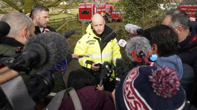 Peter Faulding (centre) CEO of private underwater search and recovery company Specialist Group International (SGI), speaks to the media in St Michael&#39;s on Wyre, Lancashire, as police continue their search for missing woman Nicola Bulley
