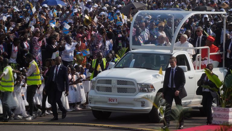 Pope Francis in the Popemobile at Ndolo airport. Pic: AP