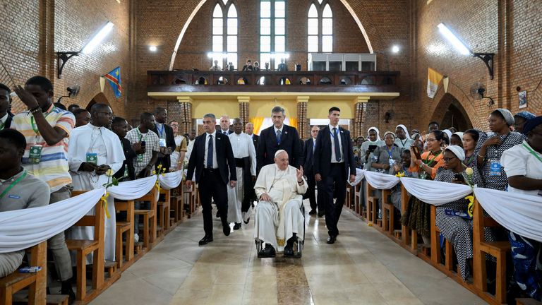 Pope Francis attends a meeting with priests, deacons, consecrated persons and seminarians at the Our Lady of the Congo Cathedral 