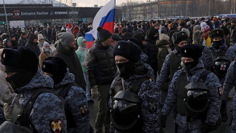 Law enforcement officers providing security outside Luzhniki Stadium 