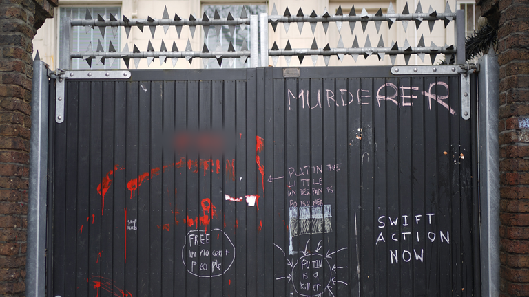 Anti-war graffiti on the gates of the Russian embassy in London in February 2022