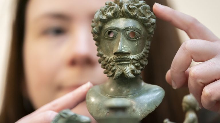 Lucy Creighton, curator of archaeology at York Museums Trust, with a rare bust thought to show Marcus Aurelius who was Roman Emperor from AD 161 - 180. Part of The Ryedale Hoard: A Roman Mystery in York
