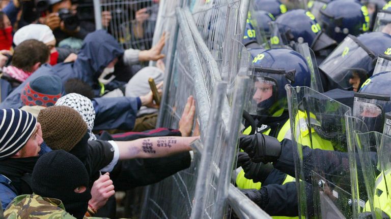 Protestors clash with police at the security fence at Auchterarder surrounding the G8 summit at Gleneagles.