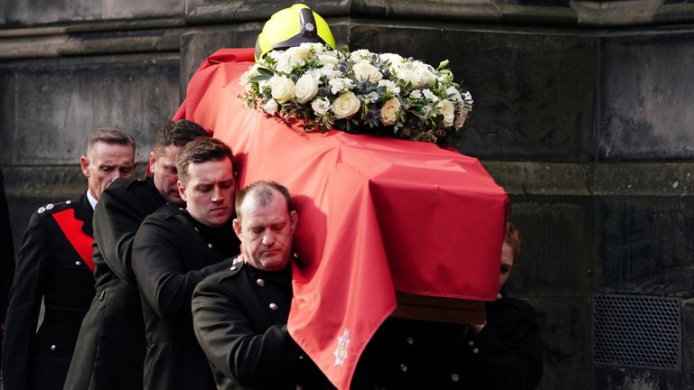The coffin of Barry Martin is carried out of St Giles&#39; Cathedral in Edinburgh, following his funeral, firefighter Barry Martin died while fighting a fire at Edinburgh&#39;s historic Jenners building. Picture date: Friday February 17, 2023.