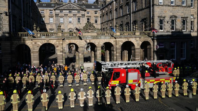 The coffin of Barry Martin arrives on a fire engine outside St Giles&#39; Cathedral in Edinburgh, ahead of his funeral, firefighter Barry Martin died while fighting a fire at Edinburgh&#39;s historic Jenners building. Picture date: Friday February 17, 2023.