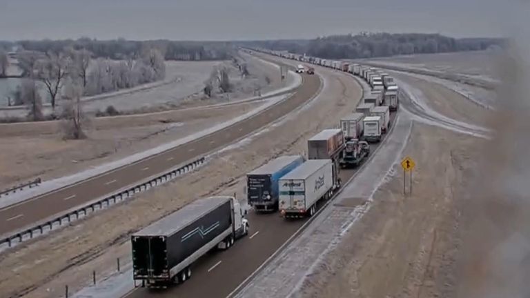 Traffic is gridlocked on an Arkansas road as a winter storm hits the region