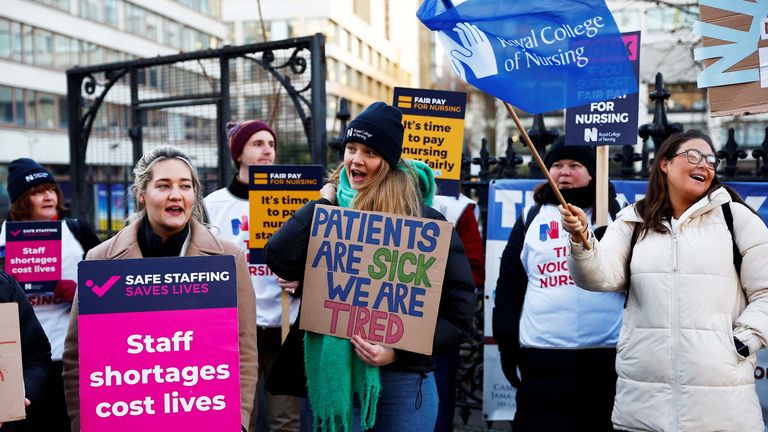 Nurses protest during a strike by NHS medical workers, amid a dispute with the government over pay, outside St Thomas&#39; Hospital, in London, Britain, February 6, 2023. REUTERS/Peter Nicholls