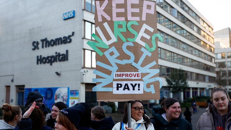 Nurses protest during a strike by NHS medical workers, amid a dispute with the government over pay, outside St Thomas&#39; Hospital, in London, Britain, February 6, 2023. REUTERS/Peter Nicholls