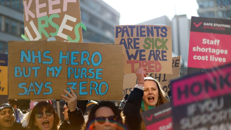 Nurses protest during a strike by NHS medical workers, amid a dispute with the government over pay, outside St Thomas&#39; Hospital, in London, Britain, February 6, 2023. REUTERS/Peter Nicholls