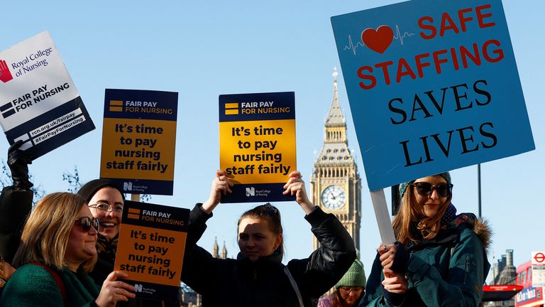 Nurses protest during a strike by NHS medical workers, amid a dispute with the government over pay, outside St Thomas&#39; Hospital, in London, Britain, February 6, 2023. REUTERS/Peter Nicholls