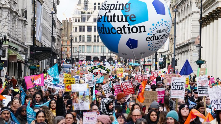 Members of the National Education Union (NEU) take part in a march from Portland Place to Westminster where they will gather for rally against the Government&#39;s controversial plans for a new law on minimum service levels during strikes. Picture date: Wednesday February 1, 2023.