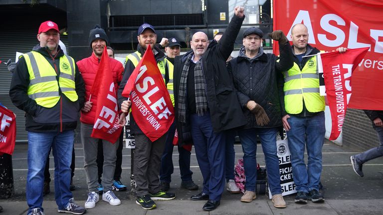 Aslef General Secretary Mick Whelan (centre) joins train workers on the picket line at Euston station in London. Train driver members of Aslef and the Rail, Maritime and Transport union (RMT) are taking to picket lines again in a long-running dispute over pay, jobs and conditions. Picture date: Friday February 3, 2023.