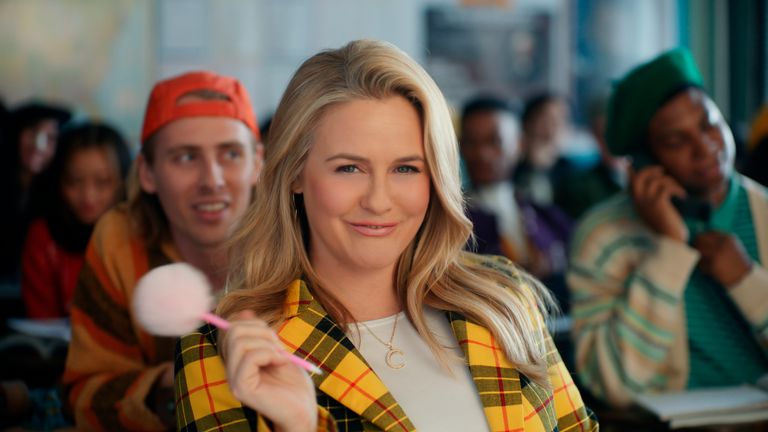 This photo provided by Rakuten Rewards shows Alicia Silverstone in a scene from Rakuten Rewards 2023 Super Bowl NFL football spot.  Big name advertisers are paying as much as $7 million for a 30-second spot during the big game on Sunday, Feb. 12, 2023. In order to get as much as a return on investment for those million, most advertisers release their ads in the days ahead of the big game to get the most publicity for their spots. (Rakuten Rewards via AP)