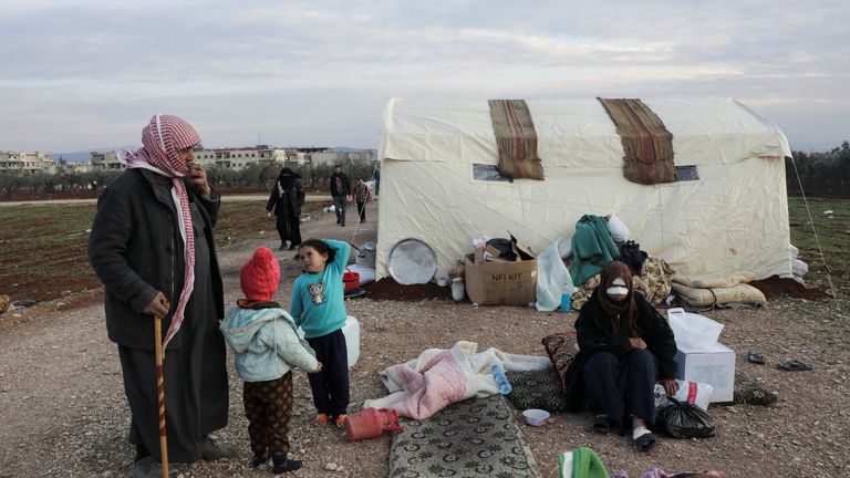 Survivors of the earthquake in the rebel-held town of Jandaris in Syria