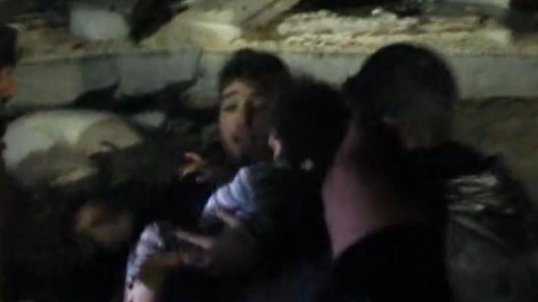 Child pulled from rubble in northern Syria