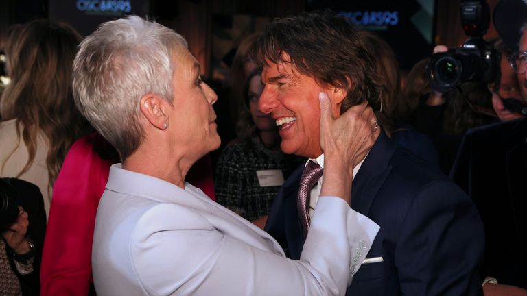 Jamie Lee Curtis, left, and Tom Cruise attend the 95th Academy Awards Nominees Luncheon on Monday, Feb. 13, 2023, at the Beverly Hilton Hotel in Beverly Hills, Calif. (Photo by Willy Sanjuan/Invision/AP)