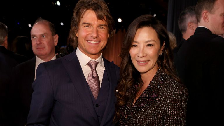 Tom Cruise, left, and Michelle Yeoh attend the 95th Academy Awards Nominees Luncheon on Monday, Feb. 13, 2023, at the Beverly Hilton Hotel in Beverly Hills, Calif. (Photo by Willy Sanjuan/Invision/AP)