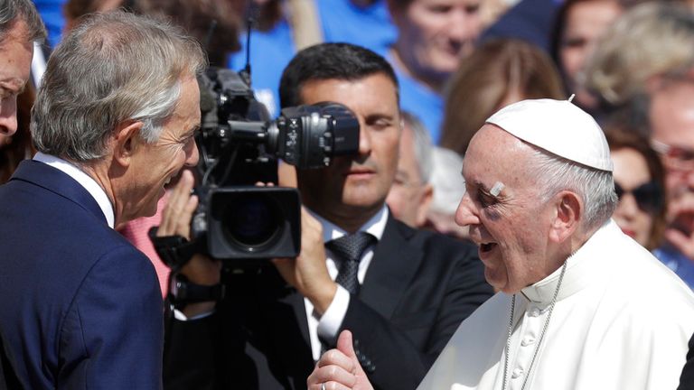 Pope Francis talks with former prime minister of the United Kingdom Tony Blair during his weekly general audience in St. Peter&#39;s Square at the Vatican, Wednesday, Sept. 13, 2017. (AP Photo/Gregorio Borgia)