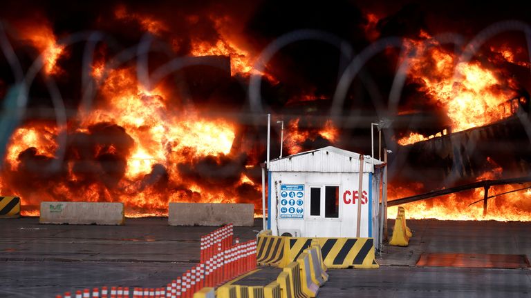 Smoke rises from burning containers at the port in  Iskenderun,Turkey 