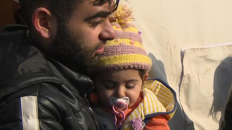 Family lives in a tent in a car park in Turkey following the quake