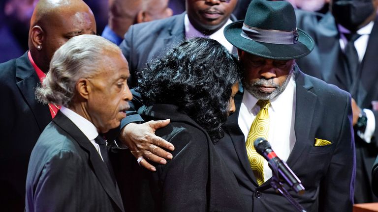 RowVaughn Wells hugs her husband Rodney Wells after speaking at the funeral service for her son Tyre Nichols at Mississippi Boulevard Christian Church in Memphis, Tenn., on Wednesday, Feb. 1, 2023. Nichols died following a brutal beating by Memphis police after a traffic stop. (Andrew Nelles/The Tennessean via AP, Pool)