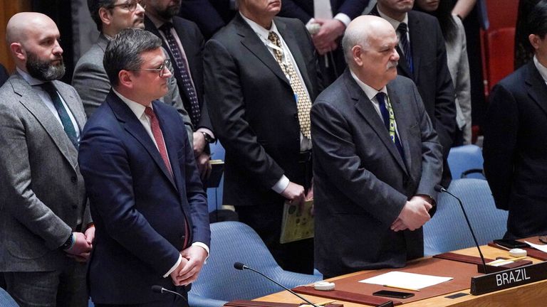 Ukraine&#39;s Foreign Minister Dmytro Kuleba, second from left, led the minute&#39;s silence before it was interrupted. Pic: AP