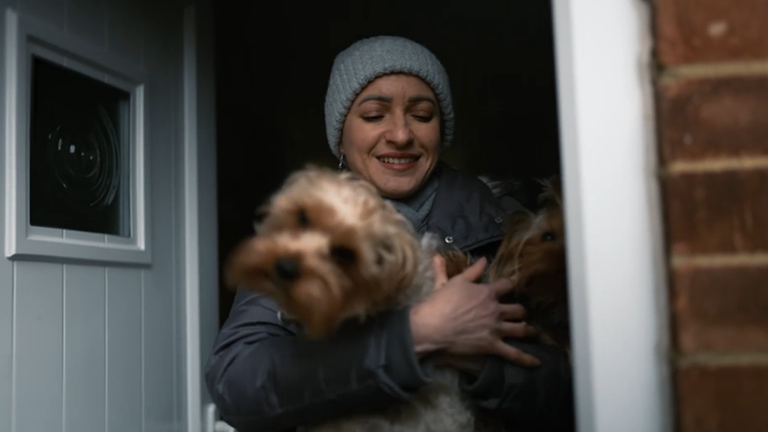 Ukrainian refugee Anfisa Vlasova with her mini Yorkshire terriers Betsy, Nora, Daisy and Teddy.