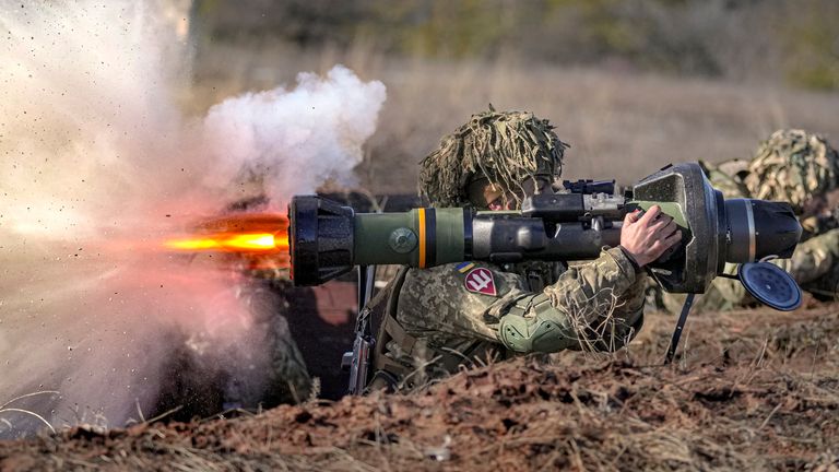 A Ukrainian serviceman fires an NLAW anti-tank weapon. Pic: AP