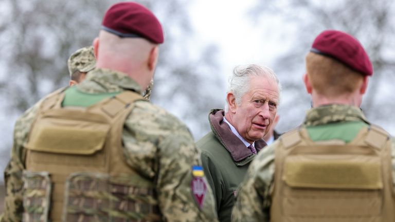 King Charles III meets with Ukrainian recruits during a visit to a training site for Ukrainian military recruits 