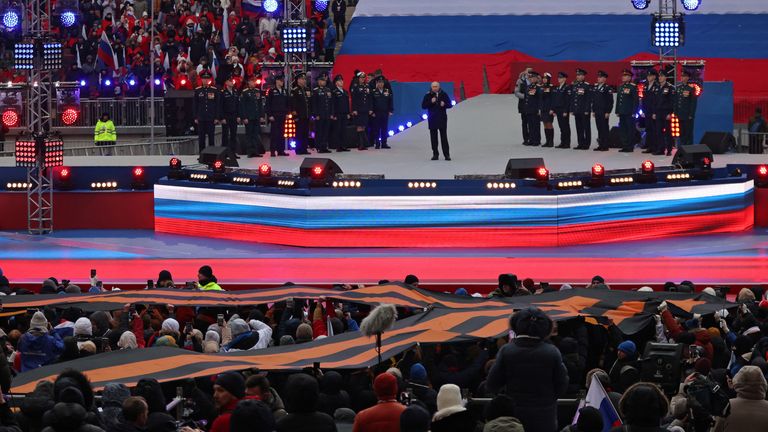 Russian President Vladimir Putin delivers a speech during a concert "Glory to the Defenders of the Fatherland" in support of the Russian armed forces involved in the country&#39;s military campaign in Ukraine, at Luzhniki Stadium in Moscow, Russia February 22, 2023. REUTERS/Stringer