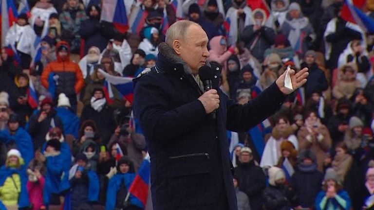 Vladimir Putin gets the crowd to cheer for the military 