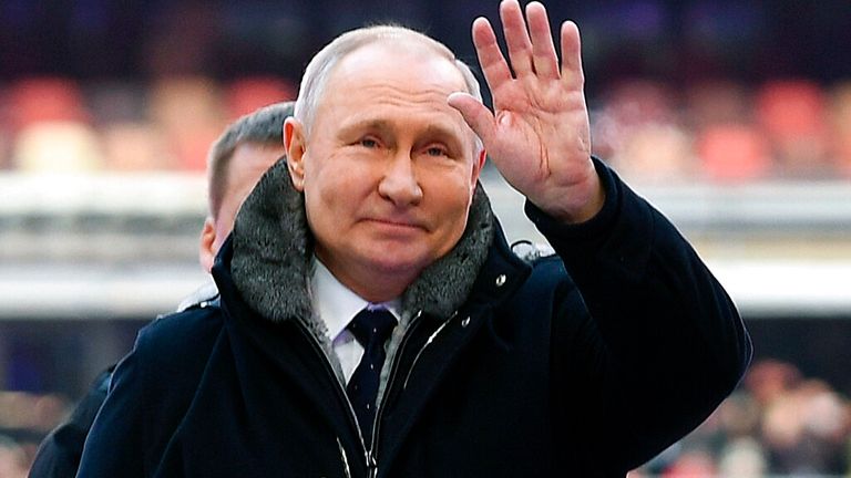 Putin waves to crowds at the &#39;Glory to the Defenders of the Fatherland&#39; concert Pic: AP 