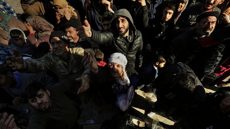 Volunteers distribute aid to people in Antakya, southern Turkey
Pic:AP