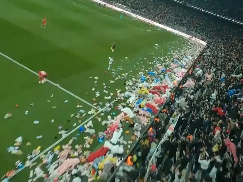 Besiktas vs Antalyaspor delayed as fans throw thousands of toys on pitch  for kids hit by earthquakes