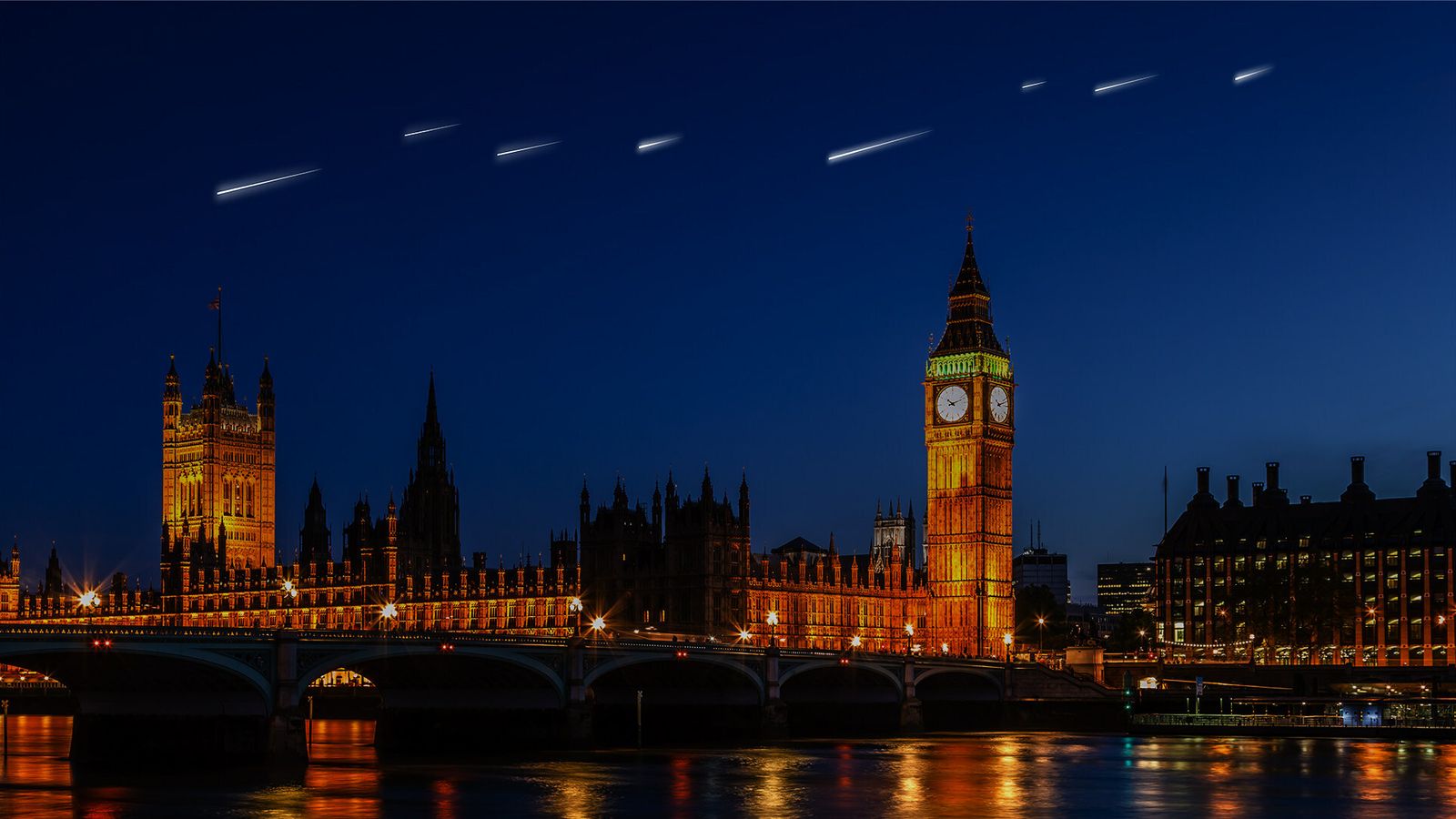 Sky Canvas: Uma representação artística de estrelas cadentes artificiais caindo sobre o Big Ben e as Casas do Parlamento.