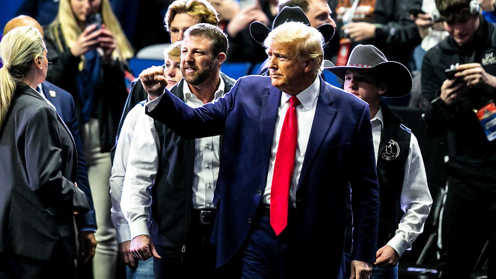 Donald Trump gets standing ovation at Oklahoma wrestling meet after claims he will be arrested on Tuesday