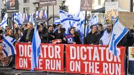 Demonstrators protest against Israeli Prime Minister Benjamin Netanyahu during his visit to Britain
