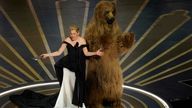 Elizabeth Banks and a bear. Pic: AP