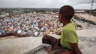 A boy overlooks a settlement for internally displaced people near Somalia&#39;s capital Mogadishu, September 2011