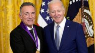 President Joe Biden presents the 2021 National Medal of the Arts to Bruce Springsteen. Pic: AP