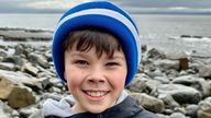 Eli, 9, who found an ancient fossil on a beach in the Vale of Glamorgan. Pic: Glenn Morris